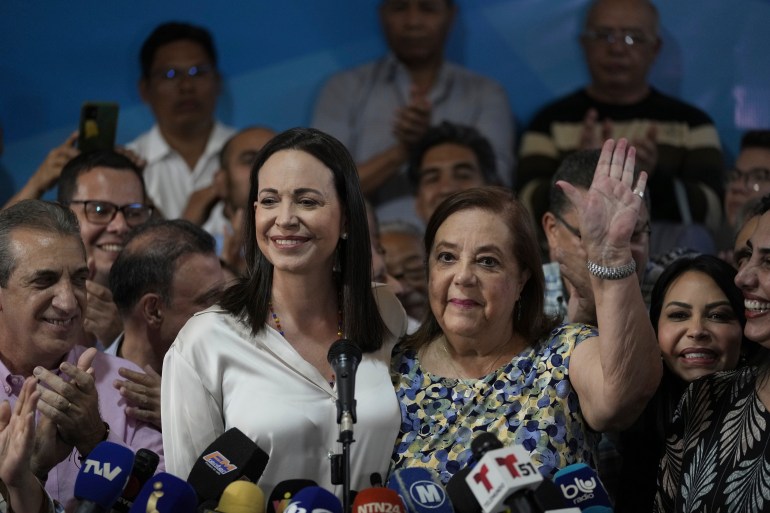 Opposition leader María Corina Machado holds a press conference accompanied by Corina Yoris, in Caracas, Venezuela, Friday, March 22, 2024