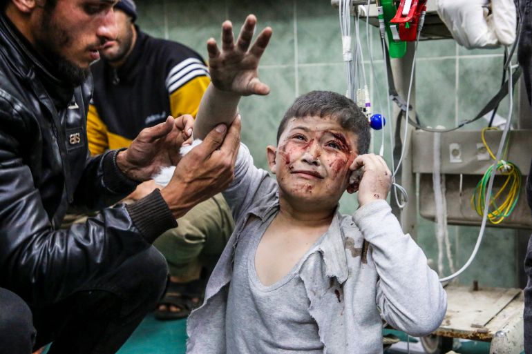 Palestinians wounded in the Israeli bombardment are brought to a hospital in Rafah, Gaza Strip