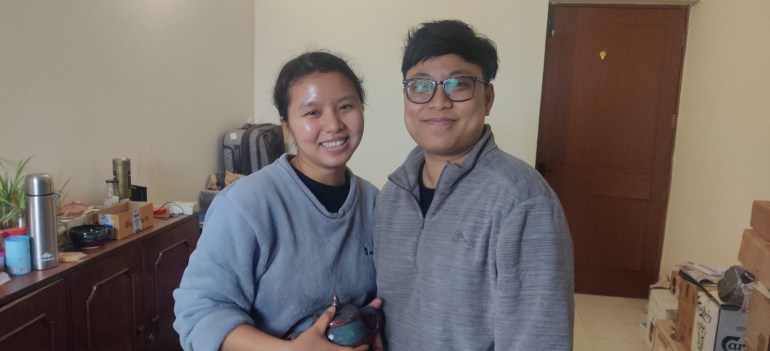 (Left) Bidotama, 26, and Mardza, 25, in their room in New Delhi