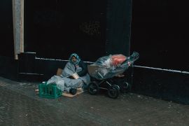 Article about how Denmark's laws targeting 'foreign visitors on city streets' affect Roma women, with a specific focus on the ban against begging.