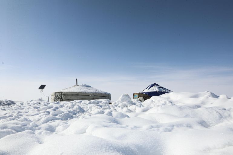 round tents buried in snow