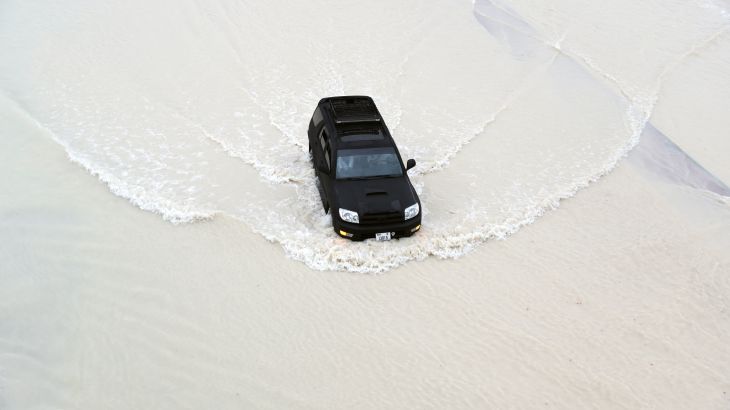 Motorists drive during heavy rainfall in Dubai, United Arab Emirates [Ali Haider/EPA]