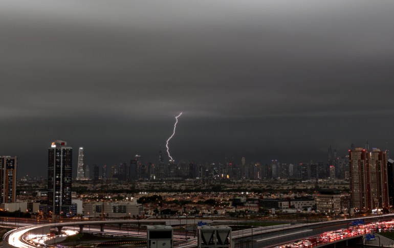 A lightning flashes through the sky during a heavy rainfall in Dubai, United Arab Emirates, 16 April 2024. A severe wave of thunderstorms with heavy rainfall is hitting most UAE's cities especially in Dubai, Sharjah and Al Ain where the Asian Champions League semi final first leg match between UAE's Al-Ain Club and Al-Hilal from Saudi Arabia has been postponed. 