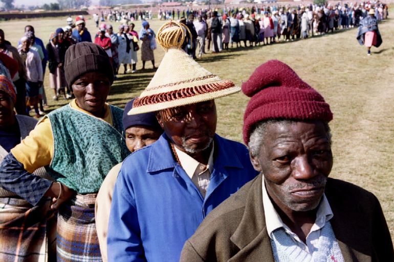 Residents of Katlehong, a township east of Johannesburg queue up to vote April 26, 1994. Blacks flocked to polling stations across South Africa to vote for the first time as polling began for the sick, the old and disabled in the country's historic all-race elections. SCANNED FROM NEGATIVE REUTERS/Juda Ngwenya AVD/CMC