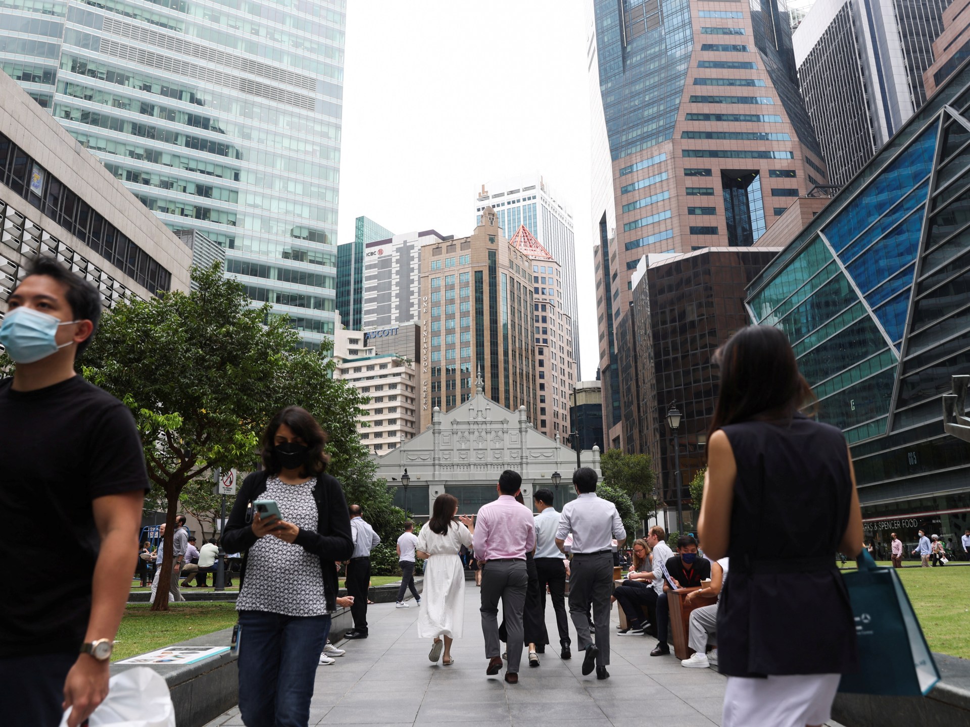 Singapore tightens rules for expat workers with an eye on local discontent