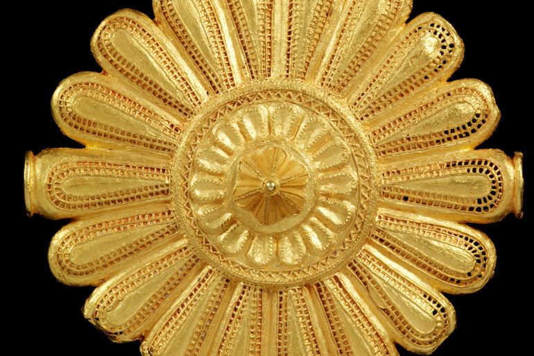 A view of a Cast gold badge, worn by the Asantehene's (king's) 'soul washer