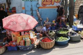 Street vendors offer produce at a market after Haiti&#039;s Prime Minister Ariel Henry pledged to step down following months of escalating gang violence, in Port-au-Prince, Haiti on March 12, 2024 [File: Reuters/Ralph Tedy Erol]