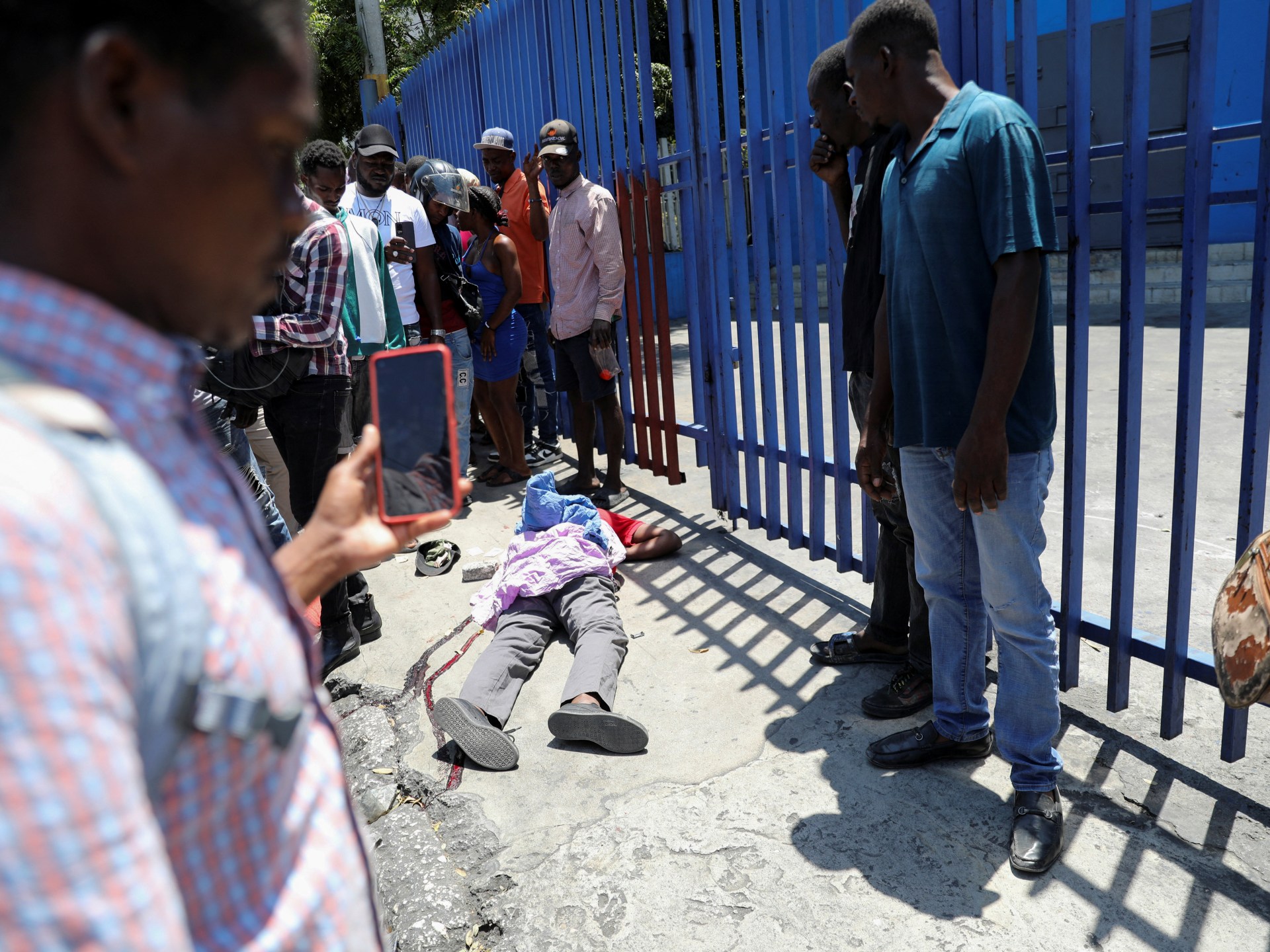 Violence flares again in Haiti as PM questions promised political solution | Gun Violence News