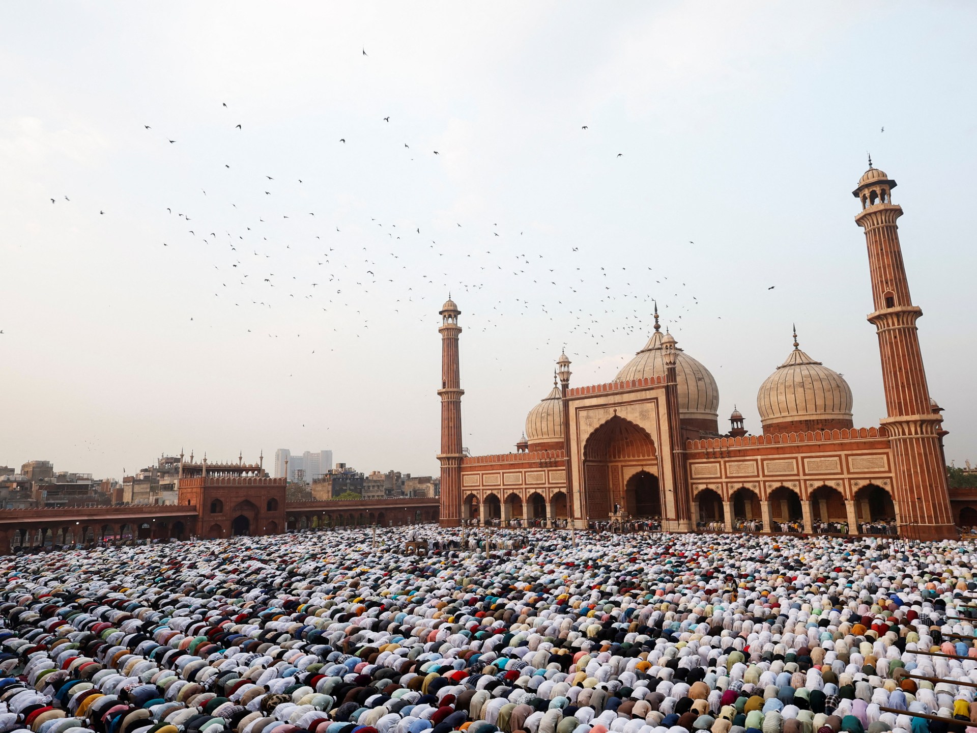 Masses gather for Eid celebrations in India | Religion