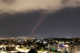 An anti-missile system operates after Iran launched drones and missiles towards Israel, as seen from Ashkelon, Israel on April 14, 2024 [Reuters/Amir Cohen]