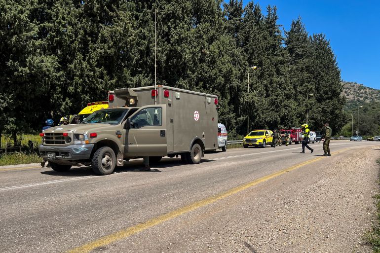 Emergency response forces work after it was reported that people were injured, amid ongoing cross-border hostilities between Hezbollah and Israeli forces, near Arab al-Aramashe in northern Israel