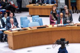 US deputy ambassador to the UN, Robert Wood, vetoes a resolution at the Security Council that would have allowed full UN membership for the state of Palestine on April 18 [Eduardo Munoz/Reuters]