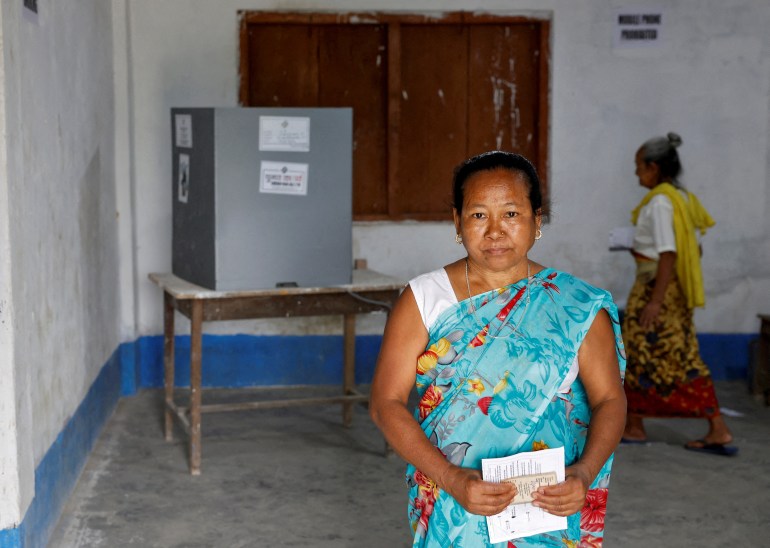 A woman from the Toto tribe leaves a polling station after casting her vote during the first phase of general election, in Alipurduar district in the eastern state of West Bengal, India, April 19, 2024. 