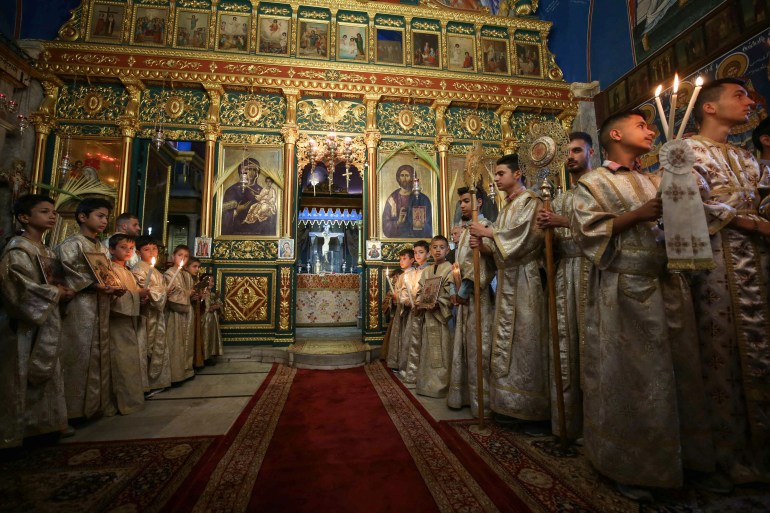 Palestinian Christians hold Palm Sunday Mass at the Greek Orthodox Saint Porphyrius Church, amid the ongoing conflict between Israel and Hamas, in Gaza City April 28