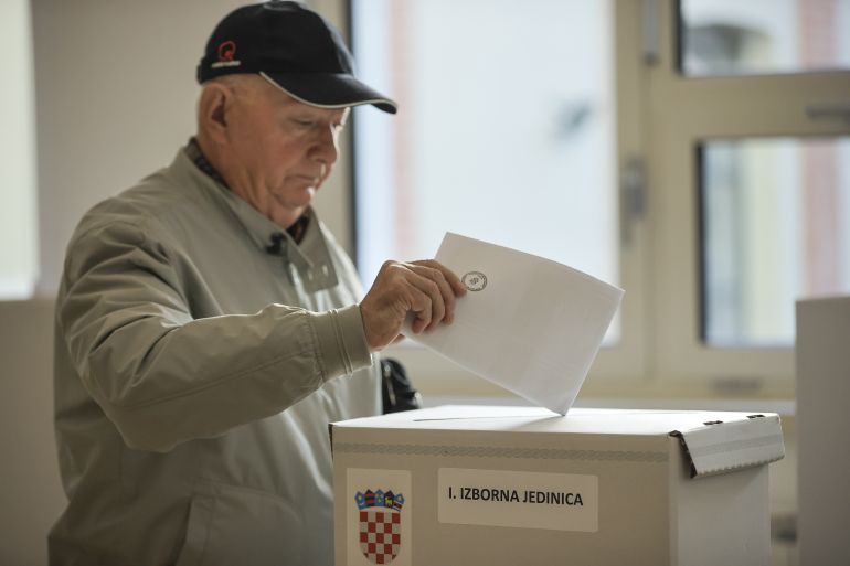 ZAGREB, CROATIA - APRIL 17: A citizen casts his vote for parliamentary elections at a polling station in Zagreb, Croatia on April 17, 2024. Voters in Croatia are heading to the polls early Wednesday for general elections to choose new members of its 151-seat national assembly. Polling stations in the newest member of the European Union will be open from 7 a.m. to 7 p.m. local time (0500GMT-1700GMT) for some 3.73 million registered voters and over 222,000 voters living abroad. ( Samır Jordamovıc - Anadolu Agency )