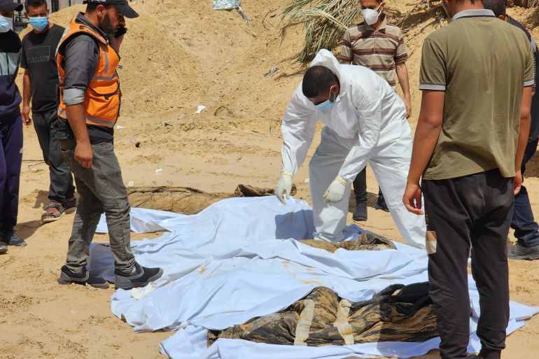 Civil Defense teams uncover 51 more bodies on Wednesday from a mass grave at Nasser