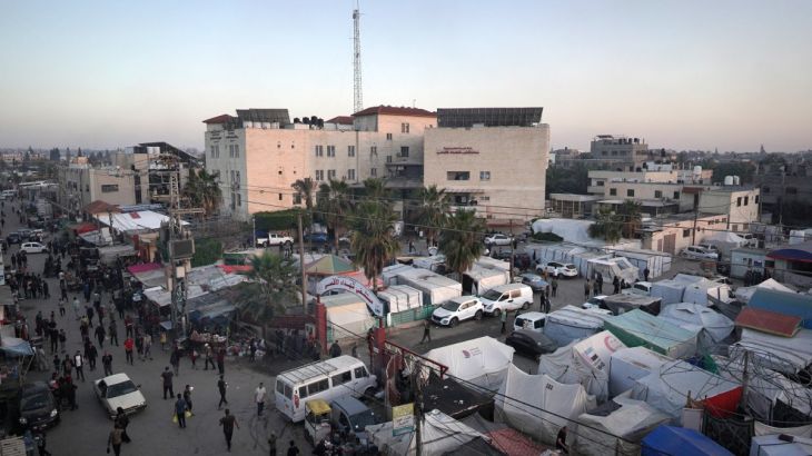 A makeshift tent city is set up for displaced Palestinians in front of the Shuhada al-Aqsa Hospital in Deir el-Balah in the central Gaza Strip