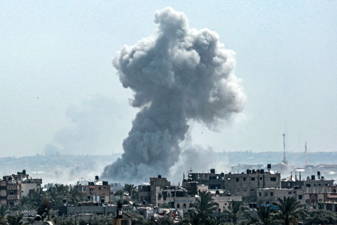 A smoke plume billows following Israeli bombardment north of Nuseirat in the central Gaza Strip