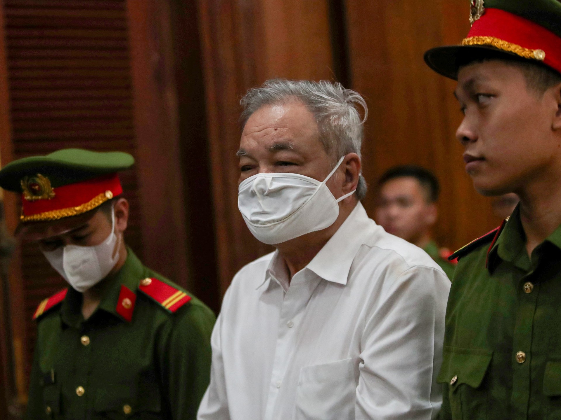 Vietnam jails soft drinks tycoon for eight years in $40m fraud case