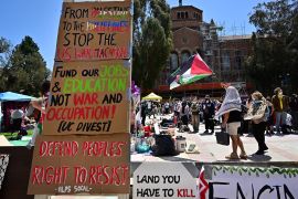 Pro-Palestinian students protest at an encampment on the campus of the University of California Los Angeles, or UCLA. [Frederic J. Brown/AFP]