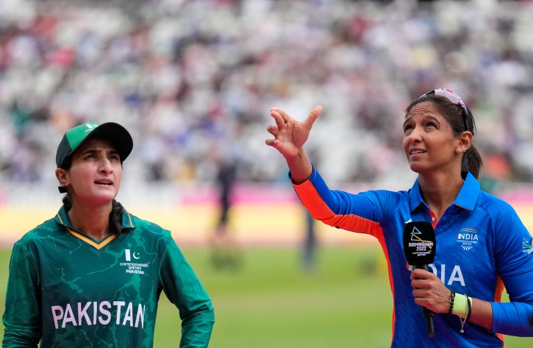 Pakistan's captain Bismah Maroof, left watches India's captain Harmanpreet Kaur