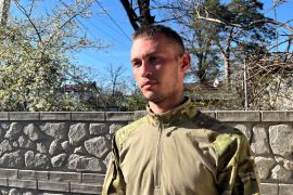 Vlad, 27, says he is proud to fight for Ukraine in its battle against his homeland, Russia [Agnieszka Pikulicka-Wilczewska/Al Jazeera]