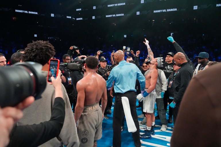 Ryan Garcia, right, celebrates after winning a super lightweight boxing match against Devin Haney Sunday, April 21, 2024, in New York. Garcia won the fight. (AP Photo/Frank Franklin II)