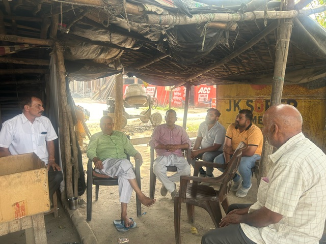 Rakesh Malik, Dhruv Kumar and Robin Chaudhary, a group of men discussing politics at a tea stall in Bulandshahr (quoted in story)
