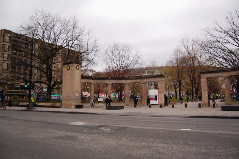A view of the Gaza protest camp through the main gate of McGill University