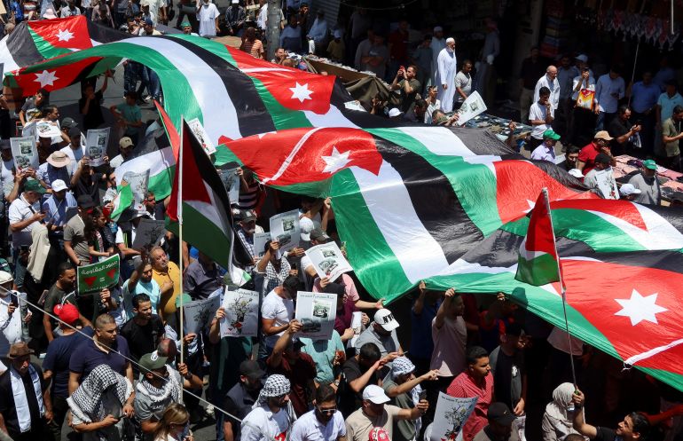 People rally in support of Gaza in Amman, Jordan