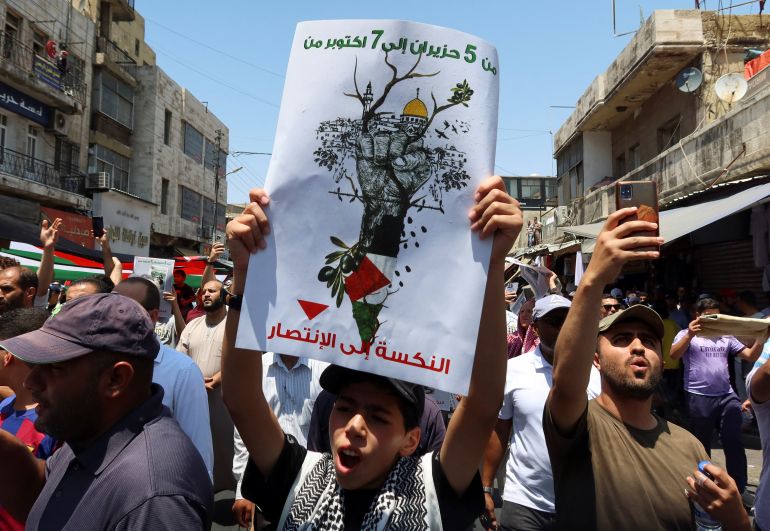 People rally in support of Gaza in Amman, Jordan