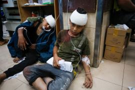 Children injured in an Israeli airstrike on a school