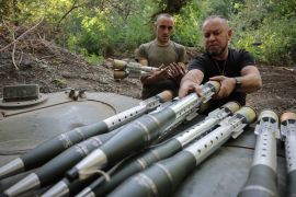In this photo provided by Ukraine's 24th Mechanised Brigade press service, servicemen of 24th mechanised brigade prepare to fire BRM1k infantry fighting vehicle towards Russian positions near Chasiv Yar town, in Donetsk region, Ukraine, Saturday Aug. 17, 2024.