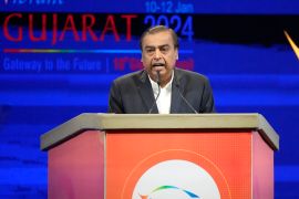 India's Reliance Industries Chairman Mukesh Ambani addresses the Vibrant Gujarat Global Summit in Gujarat, India