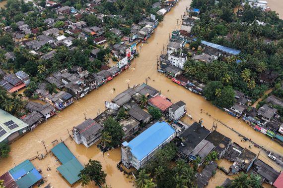 An aerial view shows houses partially submerged in floodwaters after heavy rainfall in Kaduwela on the outskirts of Colombo