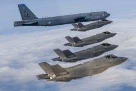 A US Air Force B-52H strategic bomber, top, flies with South Korean Air Force F-35A fighter jets during a joint air drill on April 14, 2023 at an undisclosed location in South Korea after North Korea test-fired a new intercontinental ballistic missile [File: South Korean Defence Ministry via Getty Images]