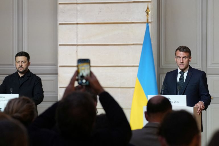 French President Emmanuel Macron and Ukrainian President Volodymyr Zelenskiy hold a joint press conference at Elysee Palace in Paris, France, December 1, 2025. [Christophe Ena/Pool via Reuters]
