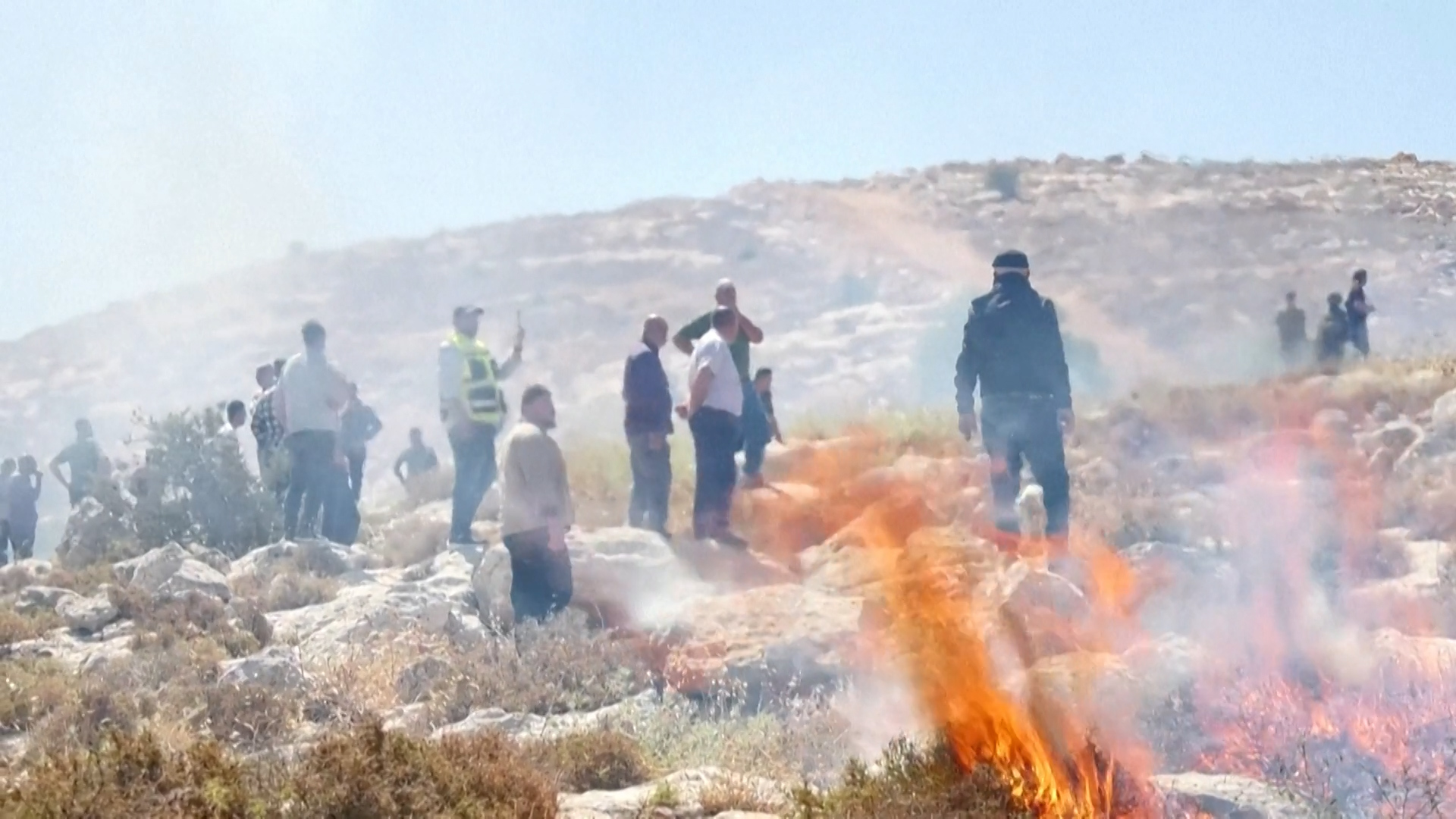 Palestinians confront Israeli settlers over land grab near Hebron