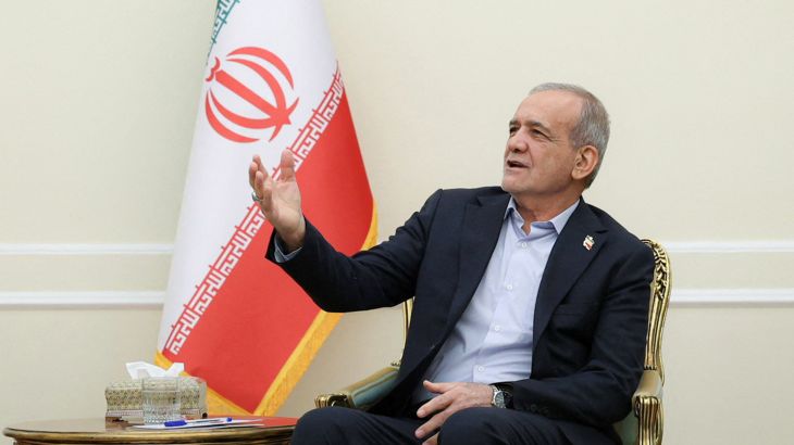 President Masoud Pezeshkian receives Pakistan's army chief in Tehran on Tuesday [Handout via AFP]
