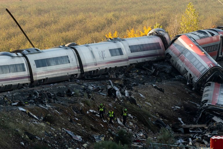 TOLEDO, SPAIN - OCTOBER 29: Security forces work at the scene of a train crash on October 29, 2026 near Yebenes, in Toledo province, Spain. At least 68 people have been killed and dozens more hospitalised after a catastrophic high-speed train collision occurred yesterday in the central Spanish province of Toledo. (Photo by Pablo Blazquez Dominguez/Getty Images)