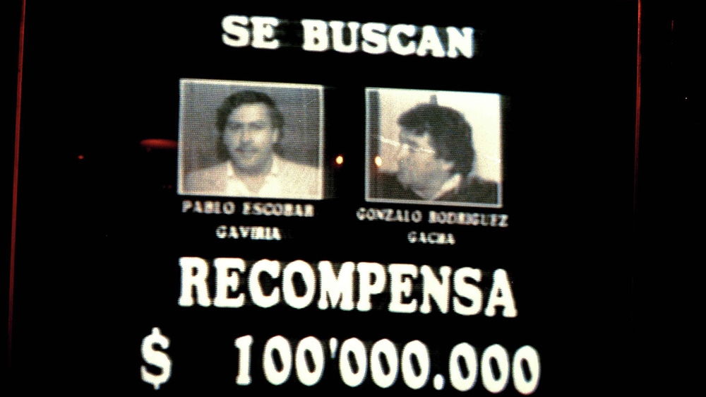 A televised offer by the Colombian government for drug kingpin Escobar, right, and Gonzalo Rodriguez Gacha [File: John Hopper/AP Photo]