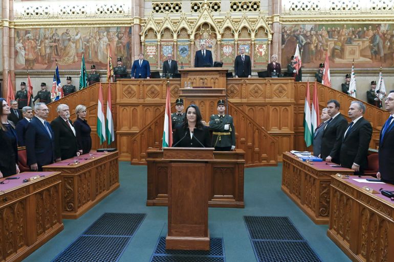 Newly elected Hungarian President Katalin Novak (C) takes an oath during her inauguration ceremony 