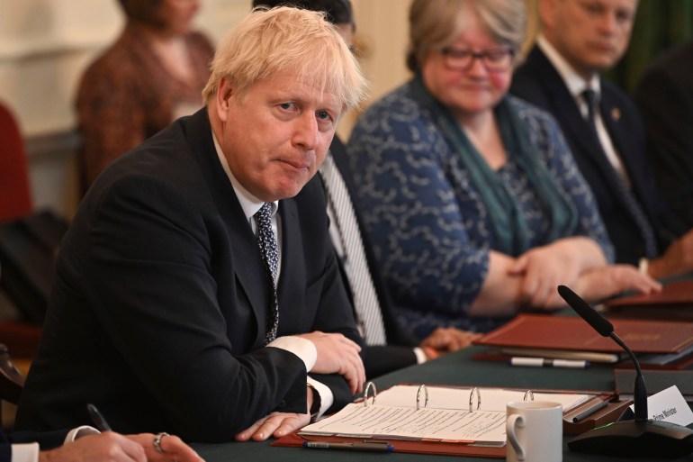 Britain's Prime Minister Boris Johnson speaks at the start of a cabinet meeting, in Downing Street, London, Tuesday, July 5, 2022. (Justin Tallis/Pool Photo via AP)