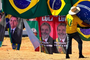 Brazil presidential election campaign flags for sale, featuring the faces of both Jair Bolsonaro and Luiz Inacio Lula da Silva