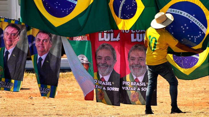 Brazil presidential election campaign flags for sale, featuring the faces of both Jair Bolsonaro and Luiz Inacio Lula da Silva