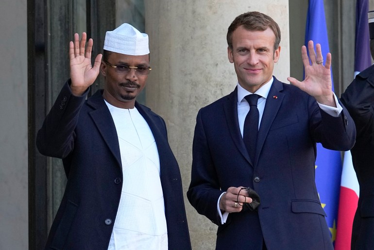 Chad's Interim President and Chairman transitional Military Council, Gen. Mahamat Idriss Deby, left, is welcomed by French President Emmanuel Macron for a meeting on the Sahel crisis at the Elysee Palace in Paris, Friday, Nov. 12, 2021. (AP Photo/Michel Euler)