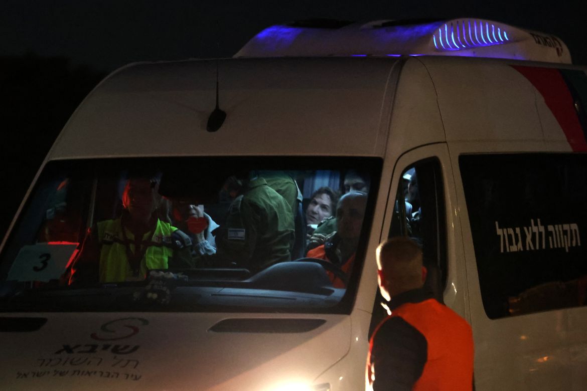 A vehicle carrying newly released hostages, held since Hamas' October 7 attacks, drives to Ramat Gan's Sheba medical centre in the Tel Aviv district.