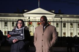 Congresswoman Rashida Tlaib standing with fellow House Democrat Jamaal Bowman at a vigil outside the White House on November 29, 2023 [Ali Harb/Al Jazeera]