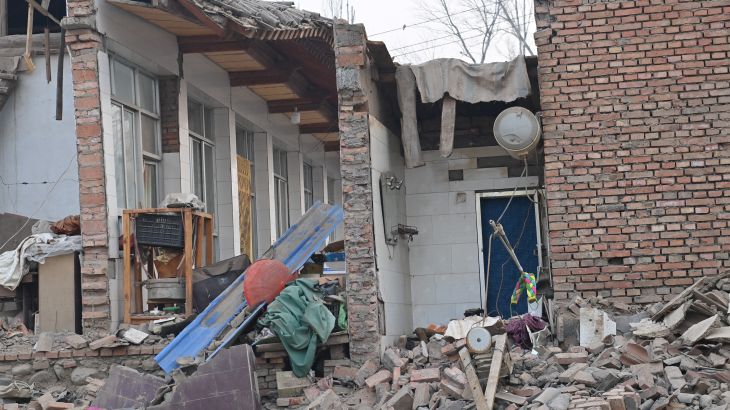 A view of rubble and damaged buildings at Dahejia town