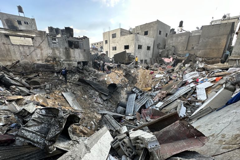 A general view of the destroyed buildings following Israeli attacks hit Jabalia Camp as residents and civil defense teams conduct search and rescue operations in the rubble of the buildings in Jabalia, Gaza.